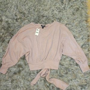 Express. Light pink crop top shirt with wrap tie on back. Size XS